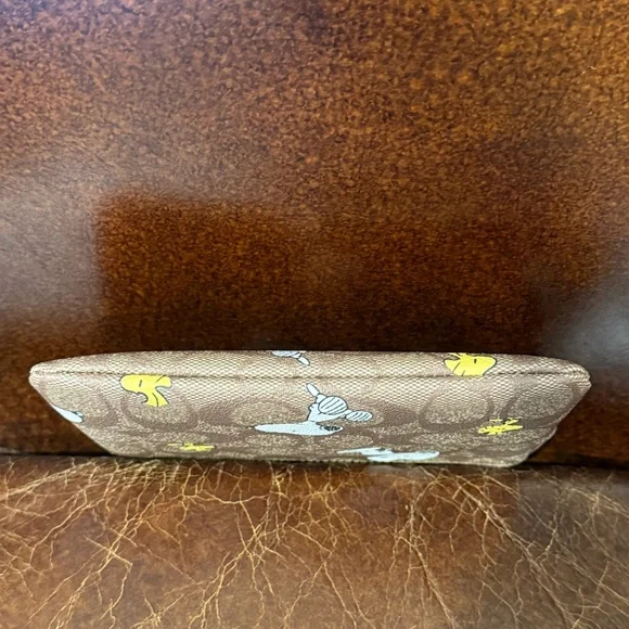 Coach x Peanuts Snoopy and Woodstock Brown Wristlet - Picture 4 of 9
